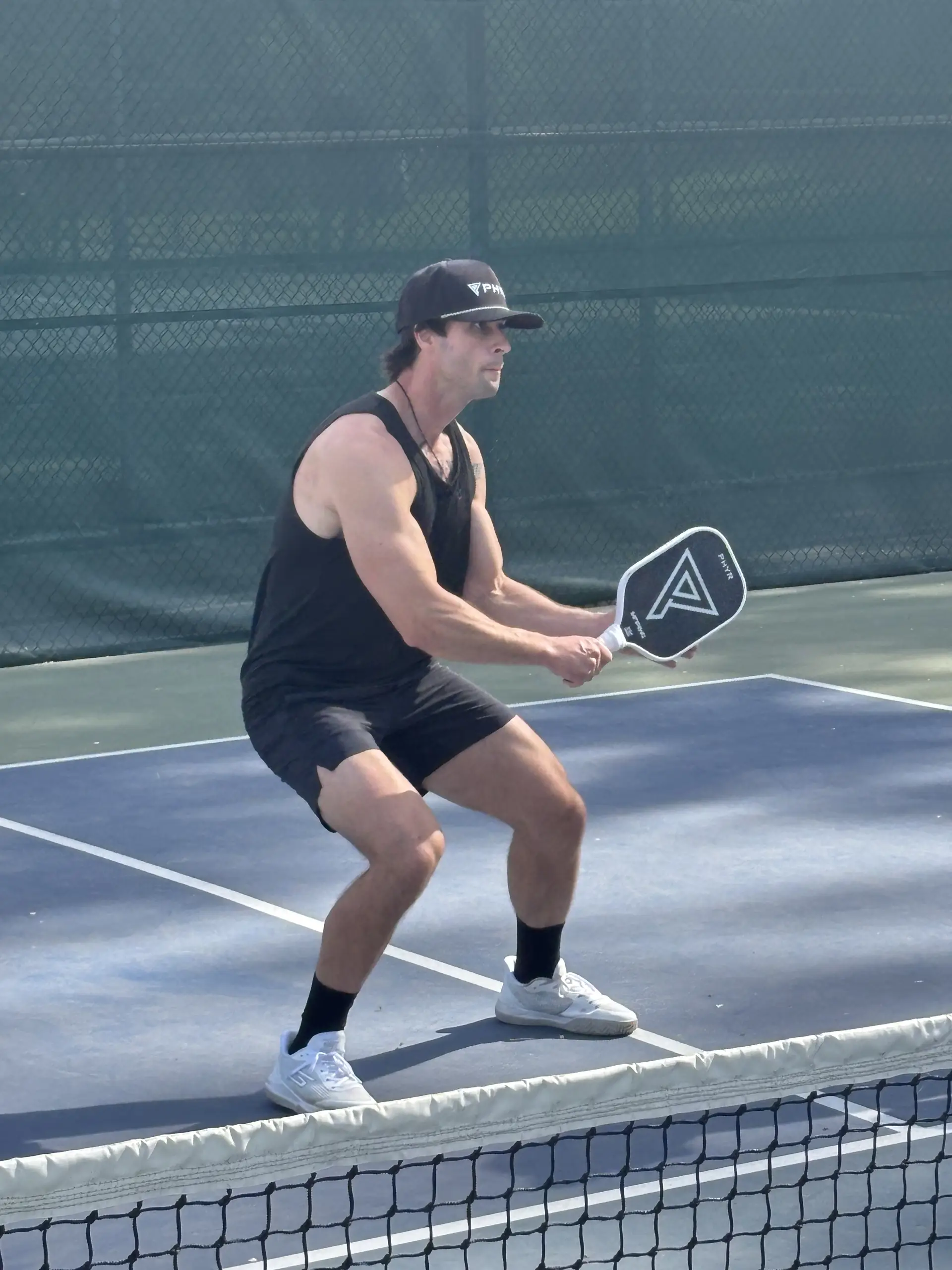PHYR player in ready position at the net